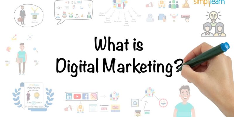 Picture of a marker board and a digital marketer writing what is digital marketing